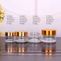 Stocked ecofriendly 10ml 20ml 30ml clear round glass cosmetic cream jar container with golden screw lid